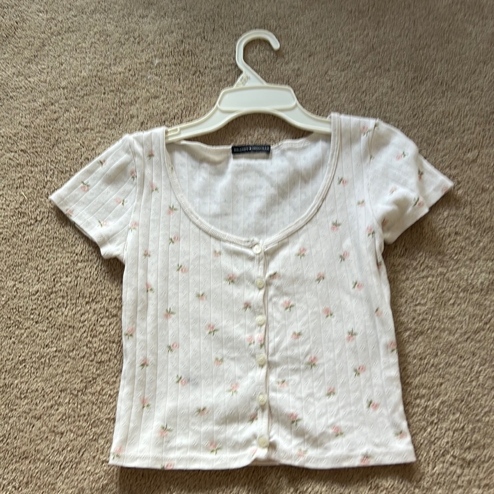 brandy Melville shirt with pink tulips on it and Little dots in the shirt